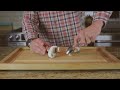 cutting a crimini mushroom