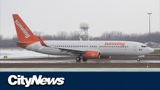 Business Report: Passengers claim Sunwing stranded them