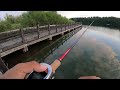 catching a nice bass under the boardwalk using nishine namazu 5