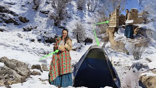 Courage against storm: Nahid single nomadic mother efforts to complete hut project in snow blizzard