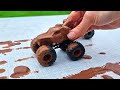 play in the garden clean up mini muddy monster trucks.