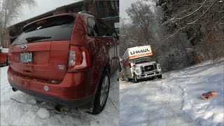 Recovering a LOADED Uhaul with a ROLLBACK and a COP stuck in his Driveway!