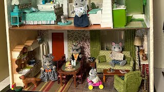 Calico Critters living in a Fisher Price Dollhouse