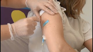 Administering medication through a line