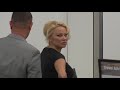 baywatch beauty pamela anderson flaunts cleavage while leaving l.a.