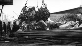 African American stevedores of US Army Service Battalion handle war supply cargo ...HD Stock Footage