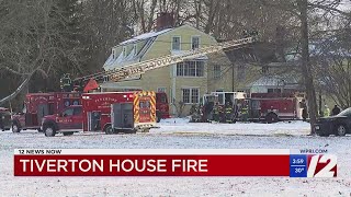 Crews battle house fire in Tiverton