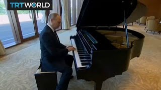 Putin plays piano ahead of talks with China's Xi Jinping