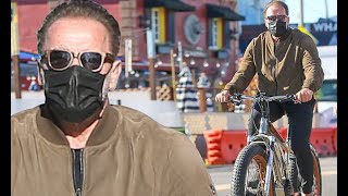 Arnold Schwarzenegger is in good form as he rides his electric bike