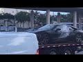 Rapper XXXTentacion's car is taken away by police Rapper XXXTentacion's car is taken away by police