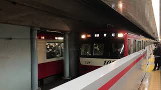 京急1000形1121編成が発車するシーン