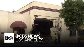 Grisly crash leaves 1 dead, 1 hospitalized after car slams into South LA church