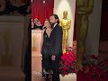 Elizabeth Olsen and Robbie Arnett at the Oscars