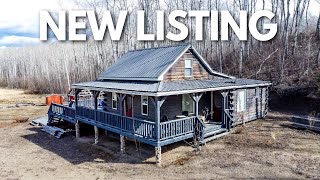 Escape to Serenity: Charming Home on 5 Acres with River Views & Golf Course Access!