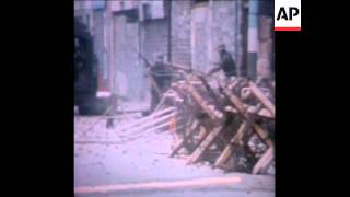 SYND 16-4-72  HI JACKED VEHICLES USED TO BARRICADE AND BLOCK ROADS INTO THE TURF LODGE ESTATE, IN BE