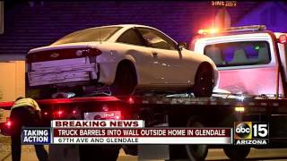 Glendale police: Truck fleeing crash scene goes through wall