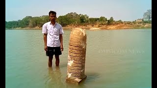 Huge Ancient Shiva Lingam Surfaces In Baitarini River In Jajpur