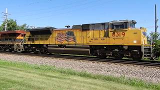 UP 5310 UP 8319 and KCS 4864 lead a Z train east through Geneva IL