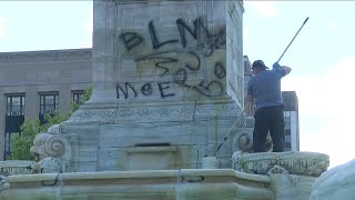 Volunteers pick up the pieces after damage from protest