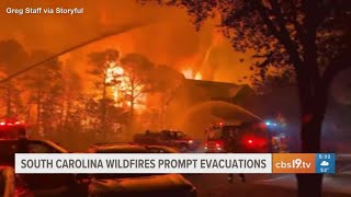 Raging wildfires in Carolinas threaten homes, prompt evacuations