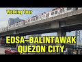 Walking along Edsa–Balintawak, Quezon City