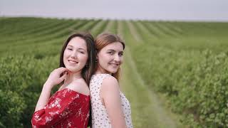 Two Women Posing Together In A Photo Shoot