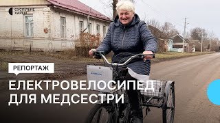 Медсестрі у прифронтовій громаді подарували електровелосипед: вона долала по 16 км пішки щодня