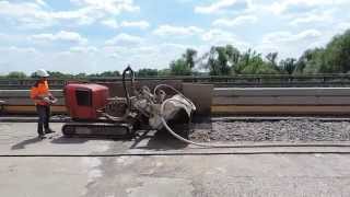 Hydrodemolition for selective concrete removal - (THP)