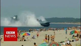 Russia: Military Hovercraft Shocks Sunbathers - BBC NEWS