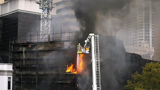 Building at Sydney's Circular Quay goes up in flames