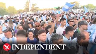 Live: Fans gather to greet Argentina team after World Cup win