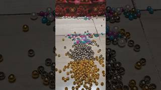 Reverse video beautiful beads in a bowl#satisfying #asmr #reversed #beads