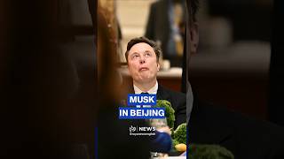Elon Musk makes faces next to Apple’s Tim Cook in Beijing