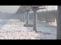 Sacred river in India covered in toxic foam