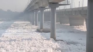 Sacred river in India covered in toxic foam