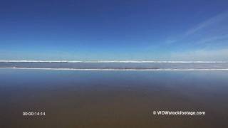 Approaching wave on calm beach SF0985