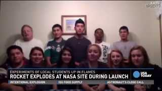 Students watch their experiments explode with rocket
