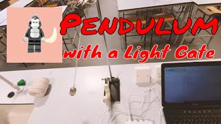 Measure the time period of a pendulum with a light gate