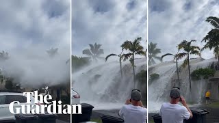 'Historic' waves crash over two-storey buildings in Hawaii