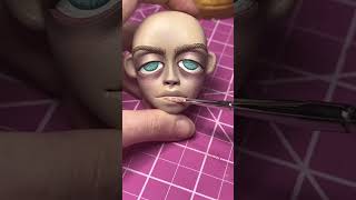 sculpture of amma in sharp objects
