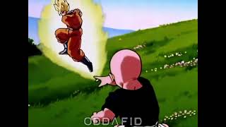 Krillin throws a rock at Goku