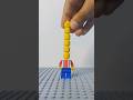 Streching  a LEGO minifigure's neck #lego #stopmotion #asmr #satisfying #funny #streching #brickfilm