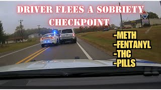 Driver attempts to avoid police checkpoint - Pursuit ends with PIT MANEUVER by Arkansas State Police