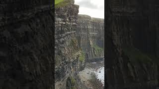 Sneaking a look over the edge at the Cliffs of Moher, County Clare, Ireland.