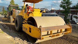 CAT 120K Grader, SAKAI SV512D Compactor \u0026 Dump Trucks Working to Construct Public Road