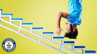 He climbs stairs with his HEAD! - Guinness World Records