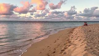 Sunset at Ha‘ena Beach in Kauai. Kauai sunsets are one of the latest in 24 hour world time zones.