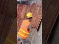 Ingenious skilled worker remove concrete mold wall