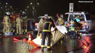 Fietser bekneld onder auto in Assen