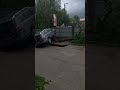 Car crashes onto fallen tree during storm in Kaunas